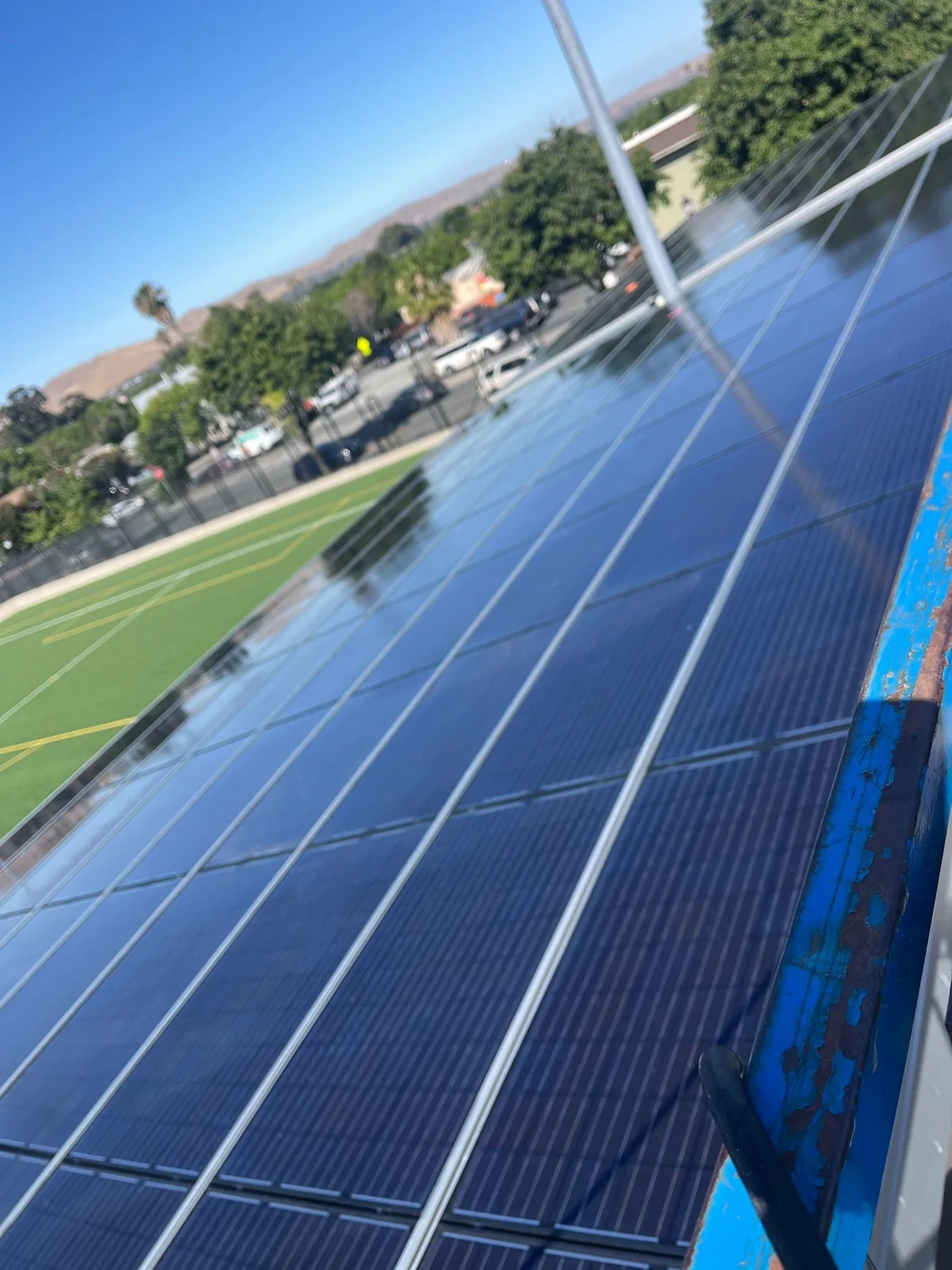 Cleaned solar carport modules at the same school district site, glass clear after deionized-water cleaning, Pittsburg CA